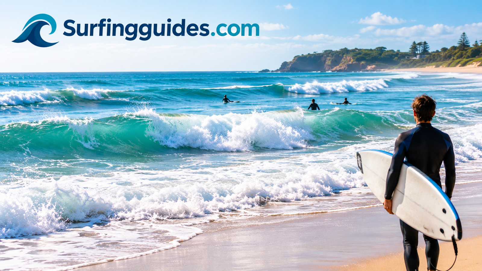 Whitewater waves rolling toward a sandy beach, ideal for first-time surfers